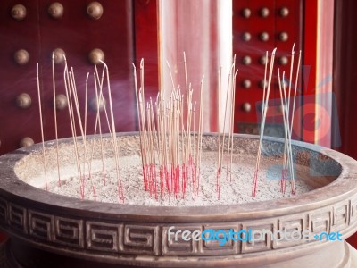 chinese-incense-stick-in-a-pot-100330376