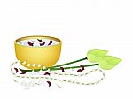 water-bowl-and-flowers-for-songkran-festival-100299655