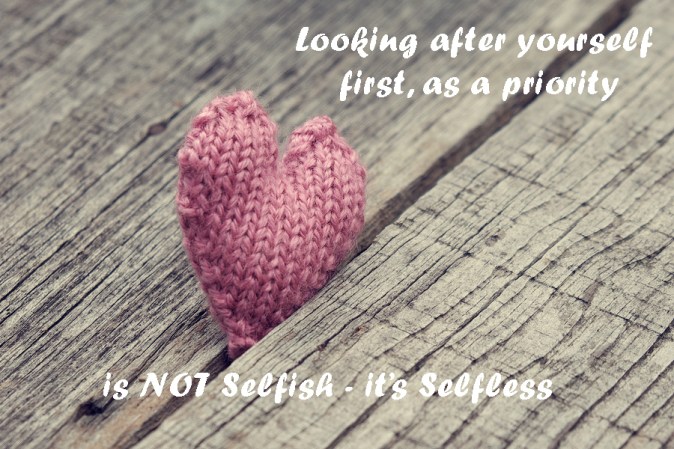 Lonely Heart On Wooden Background